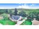 Expansive landscaped home with detached garage, long driveway and greenery in the rear at 508 Starr Ridge Dr, Lake Wales, FL 33898