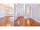 Bright foyer with hardwood floors and a view of the dining room and front door at 508 Starr Ridge Dr, Lake Wales, FL 33898