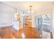 Spacious kitchen with wooden floors, stainless steel appliances, and an open floorplan at 508 Starr Ridge Dr, Lake Wales, FL 33898