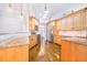 Modern kitchen features wood cabinets, granite countertops, and stainless steel appliances at 508 Starr Ridge Dr, Lake Wales, FL 33898