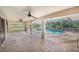 Covered patio/Lanai area with brick floors, ceiling fans, and a view of the sparkling pool at 508 Starr Ridge Dr, Lake Wales, FL 33898