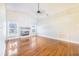 Bright living room featuring fireplace, vaulted ceiling, and large windows at 508 Starr Ridge Dr, Lake Wales, FL 33898