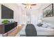 Comfortable main bedroom featuring hardwood floors, TV, ensuite bath and ample closet space at 508 Starr Ridge Dr, Lake Wales, FL 33898