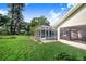 Backyard pool with a large screened enclosure, adjacent to home at 508 Starr Ridge Dr, Lake Wales, FL 33898