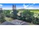 An elevated view of a screened pool with views of a verdant field beyond at 508 Starr Ridge Dr, Lake Wales, FL 33898
