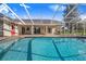 Sparkling pool featuring a screened enclosure, perfect for outdoor relaxation and entertaining at 508 Starr Ridge Dr, Lake Wales, FL 33898
