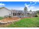 This beautiful outdoor screened-in pool area comes complete with landscaping at 508 Starr Ridge Dr, Lake Wales, FL 33898