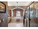 Opulent bathroom with a soaking tub, tiled shower, decorative pillars, and luxurious finishes at 5200 Pebble Beach Blvd, Winter Haven, FL 33884