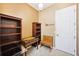 Cozy office with dark wood furnishings and natural lighting at 5200 Pebble Beach Blvd, Winter Haven, FL 33884