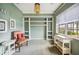 Bright room with custom built-ins, large window, and neutral decor at 5200 Pebble Beach Blvd, Winter Haven, FL 33884