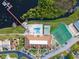 An aerial view shows a pool, tennis courts, and the dock, offering recreational opportunities at 530 Eastlake Dr, Haines City, FL 33844