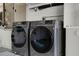 Laundry area featuring Samsung washer and dryer at 530 Eastlake Dr, Haines City, FL 33844