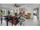 Bright living room featuring tile floors, neutral tones, and contemporary decor at 530 Eastlake Dr, Haines City, FL 33844