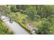 Aerial view of a community park with mature trees, picnic areas, and a dog park for outdoor recreation at 5341 Hogan Ln, Winter Haven, FL 33884