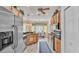 Stainless steel refrigerator in bright kitchen with breakfast nook at 5341 Hogan Ln, Winter Haven, FL 33884