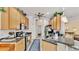 Kitchen with stainless steel appliances, laminate countertops, and decorative accents at 5341 Hogan Ln, Winter Haven, FL 33884
