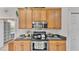 Kitchen featuring stainless steel appliances and convenient access to the breakfast nook at 5341 Hogan Ln, Winter Haven, FL 33884