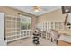 Bright home office with built-in shelving, providing ample storage and a dedicated workspace at 5341 Hogan Ln, Winter Haven, FL 33884