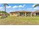 Well-maintained home featuring a cozy screened-in lanai perfect for enjoying outdoor living at 5341 Hogan Ln, Winter Haven, FL 33884