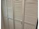 Closet doors with adjustable slats for better ventilation at 6107 Grand Oaks Se Dr, Winter Haven, FL 33884