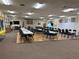 Spacious community hall with tables, chairs, and a dance floor at 6107 Grand Oaks Se Dr, Winter Haven, FL 33884