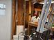 Garage with storage shelves, cleaning supplies, a ladder, and a walker at 6107 Grand Oaks Se Dr, Winter Haven, FL 33884