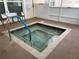 Relaxing hot tub area with seating for leisure and relaxation at 6107 Grand Oaks Se Dr, Winter Haven, FL 33884