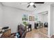 Home office area featuring natural light and a mirrored closet at 612 Ralph St, Auburndale, FL 33823