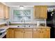 A functional kitchen sink offers a spacious layout for everyday use at 612 Ralph St, Auburndale, FL 33823