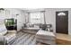 Living room has a couch, a fish tank and a door to the outside at 612 Ralph St, Auburndale, FL 33823