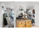 A cozy living room with a decorative coffee bar and fish tank for relaxing at 612 Ralph St, Auburndale, FL 33823