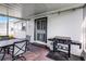 Relaxing outdoor patio with seating and a grill at 612 Ralph St, Auburndale, FL 33823