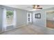 Bedroom featuring a ceiling fan and carpet flooring at 6560 Horizon Point Dr, Lakeland, FL 33813