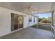 This is a view of the patio with screened enclosure and ceiling fan at 6560 Horizon Point Dr, Lakeland, FL 33813