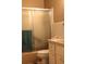 Bathroom with shower and frosted glass doors at 670 Avenue N Se, Winter Haven, FL 33880