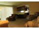 Comfortable living area with a view into the kitchen and plenty of seating at 670 Avenue N Se, Winter Haven, FL 33880