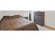 Cozy bedroom featuring a comfortable bed, matching nightstand and dresser, and natural light at 730 Colville Pl, Kissimmee, FL 34759