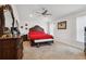 Spacious main bedroom featuring a ceiling fan and large windows at 730 Colville Pl, Kissimmee, FL 34759