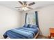 Bedroom featuring a ceiling fan, a comfortable bed and bright, neutral decor at 780 Gila Dr, Kissimmee, FL 34759