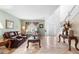 Inviting living room with tile floors, staircase, large windows, and comfortable seating at 780 Gila Dr, Kissimmee, FL 34759