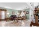 Comfortable living room with elegant decor, including tile flooring, sofa, and love seat at 780 Gila Dr, Kissimmee, FL 34759