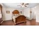 Spacious main bedroom with hardwood floors, decorative furniture, and ample closet space at 780 Gila Dr, Kissimmee, FL 34759