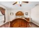 Cozy main bedroom with a decorative headboard, hardwood floors, and ample natural light at 780 Gila Dr, Kissimmee, FL 34759