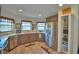 The modern kitchen has stainless steel appliances, wooden cabinets, and lots of counter space at 8243 Campbell Crossing Cir, Lakeland, FL 33810