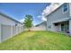 Well-maintained backyard with a privacy fence and a play area, ideal for entertaining and relaxation at 825 Grazie Loop, Davenport, FL 33837