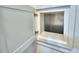 Close up of a kitchen cabinet, showcasing storage space, construction, and clean interior at 825 Grazie Loop, Davenport, FL 33837