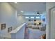 Upstairs loft area with plenty of natural light and a comfortable seating arrangement at 825 Grazie Loop, Davenport, FL 33837