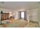 Bright and airy living room with neutral walls, light-colored floors, and a decorative rug at 842 Cinnamon Dr, Winter Haven, FL 33880