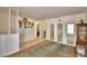 Inviting living room featuring tile floors, and an open layout with access to other living spaces at 842 Cinnamon Dr, Winter Haven, FL 33880