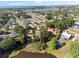 Expansive aerial view of a residential neighborhood near a large lake at 102 Lake Ring Dr, Winter Haven, FL 33884